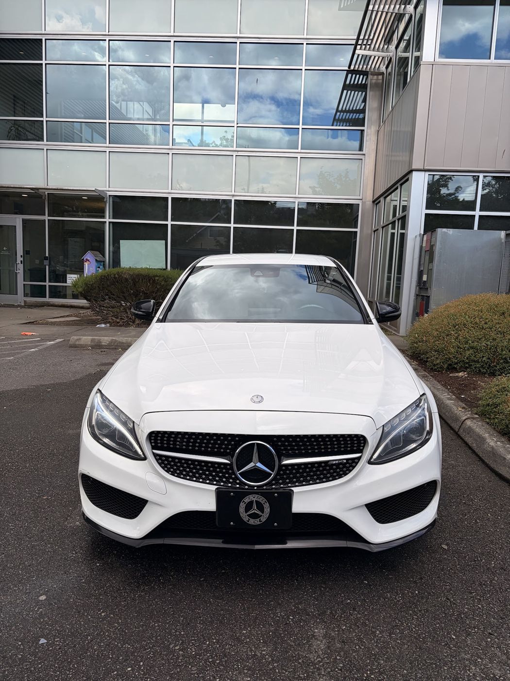 White Mercedes C-Class, front, after a detail
