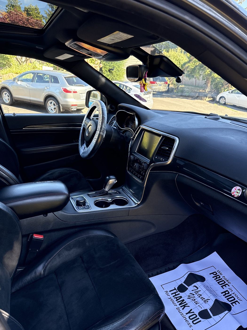 Jeep interior with clean dash and seats after a detail